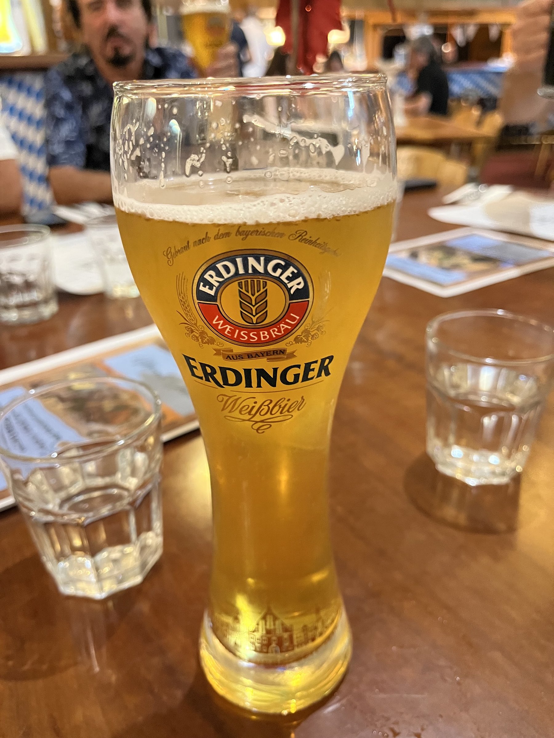 A tall glass of German wheat beer